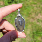 Pendentif obsidienne oeil céleste 4,8 cm wire wrapping argenté
