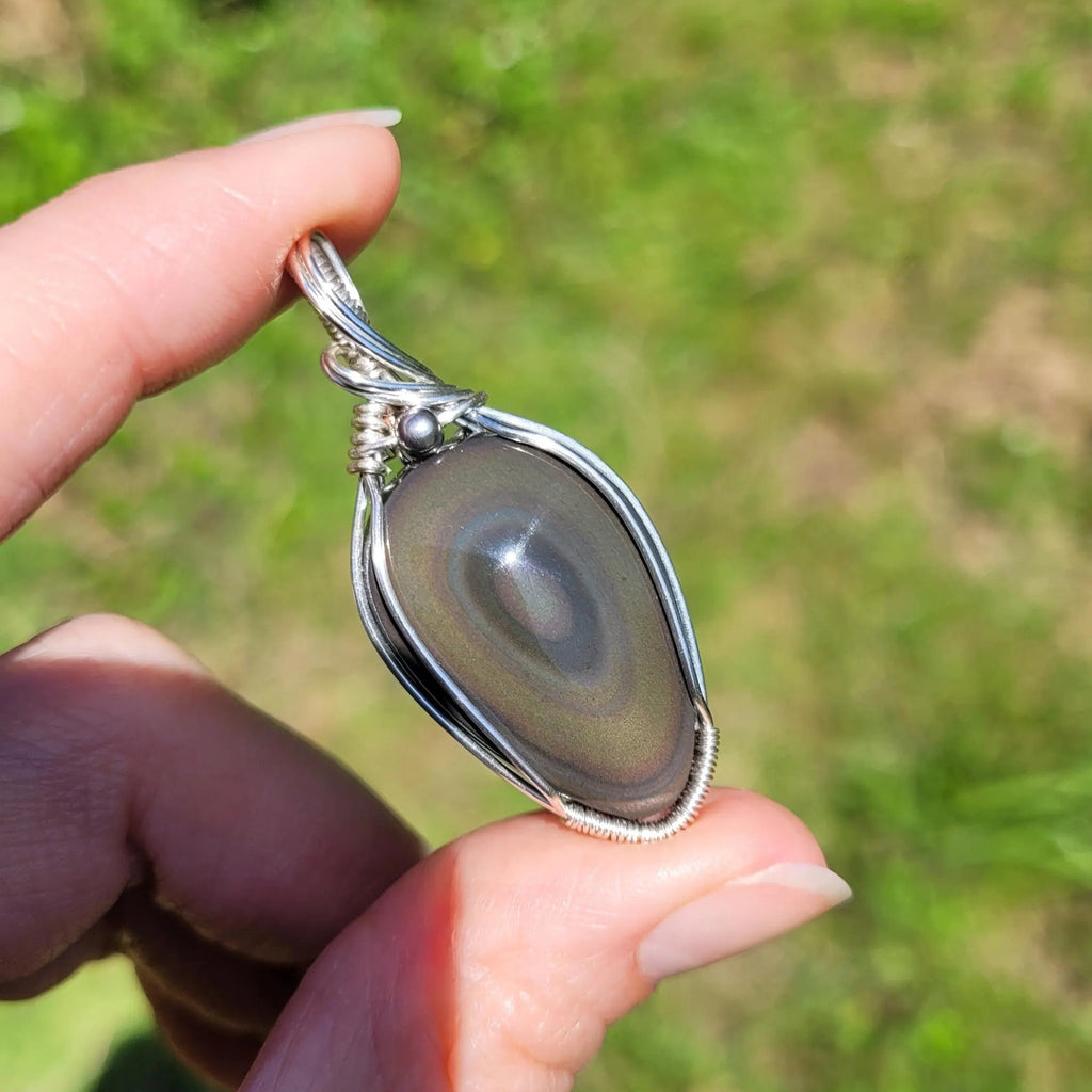 Pendentif obsidienne oeil céleste 4,8 cm wire wrapping argenté