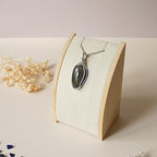 Pendentif obsidienne oeil céleste 4,8 cm wire wrapping argenté