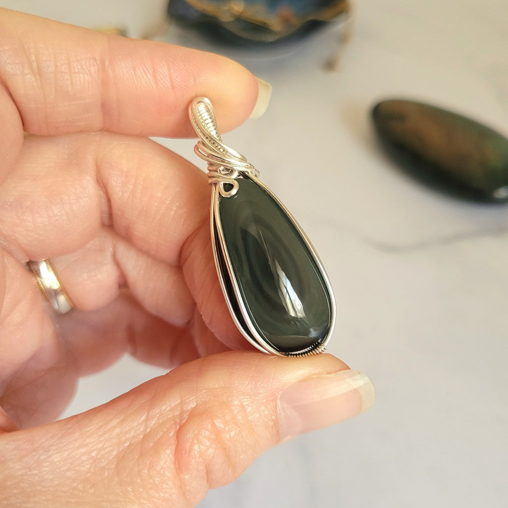 Pendentif obsidienne oeil céleste 4,5 cm wire wrapping