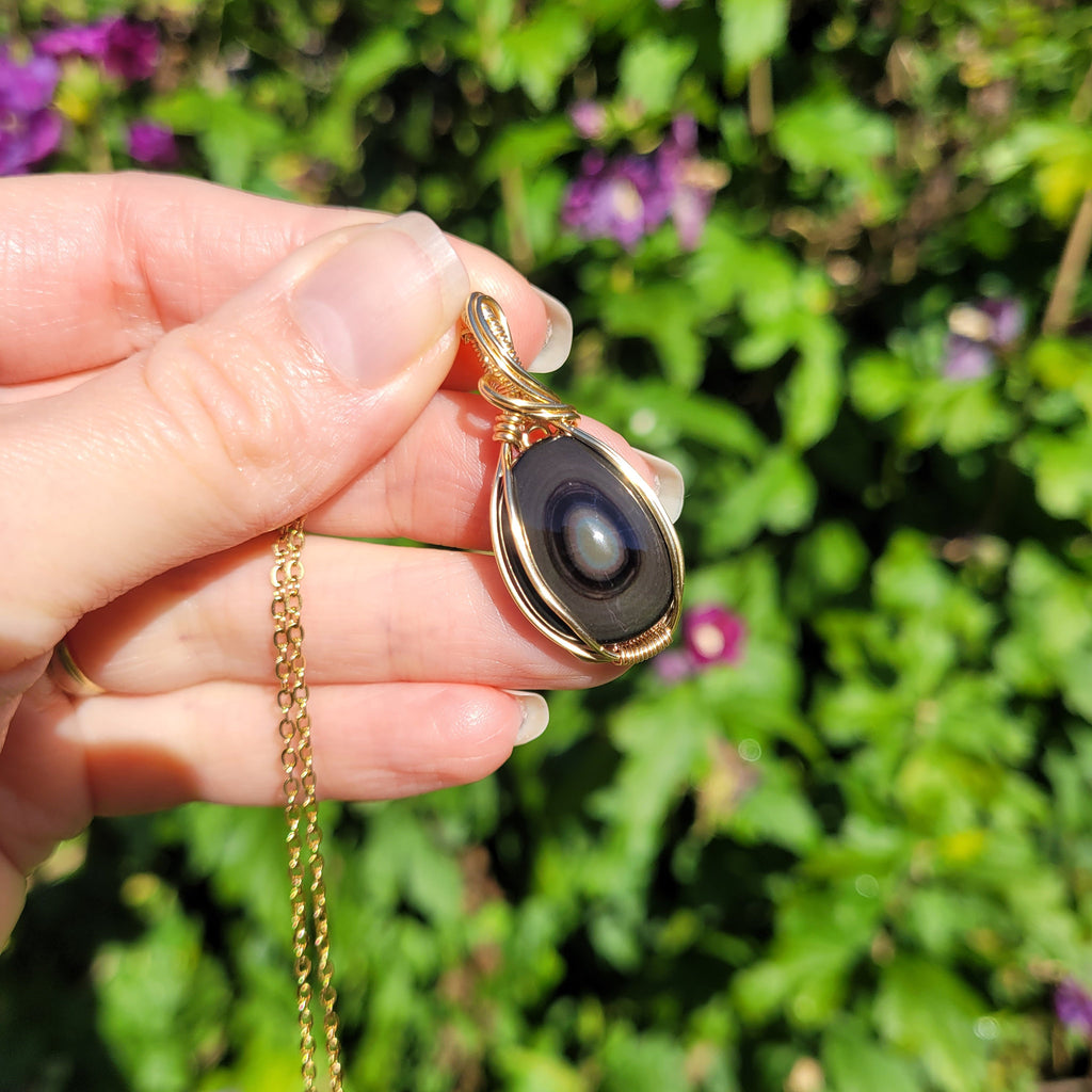 Pendentif obsidienne oeil céleste 3,8 cm wire wrapping