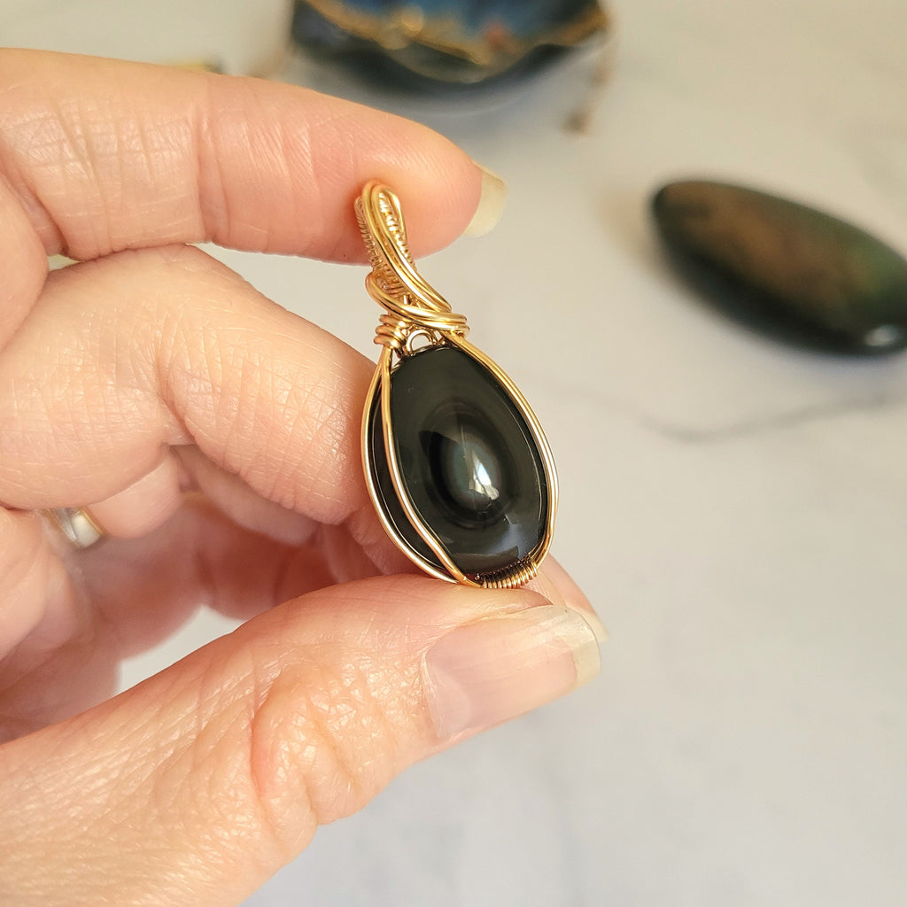 Pendentif obsidienne oeil céleste 3,8 cm wire wrapping