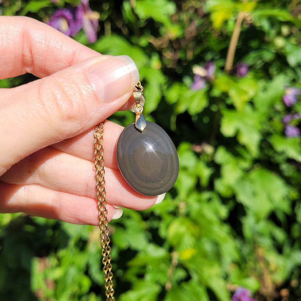 Pendentif en obsidienne oeil céleste 2,7 cm bélière dorée