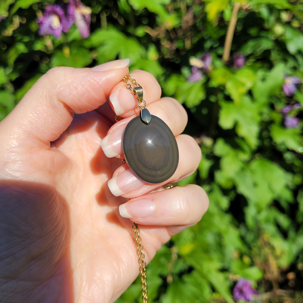 Pendentif en obsidienne oeil céleste 2,7 cm bélière dorée