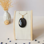 Pendentif obsidienne œil céleste – reflets violets – 4 cm