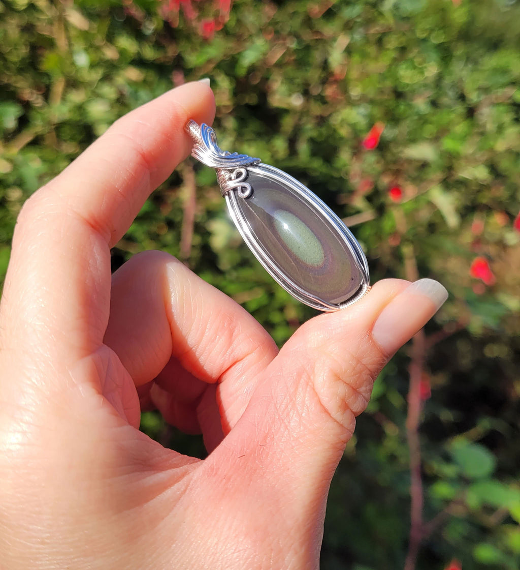 Pendentif obsidienne oeil céleste 5,3 cm wire wrapping argenté