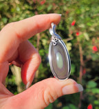 Pendentif obsidienne oeil céleste 5,3 cm wire wrapping argenté