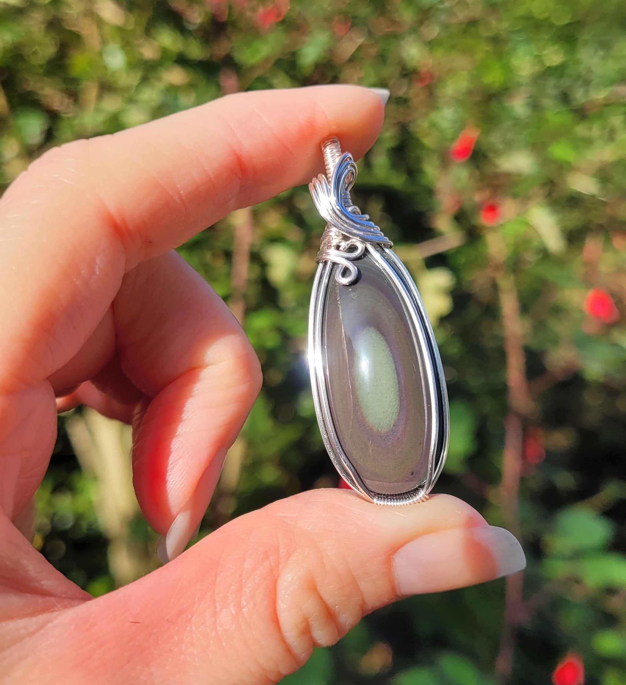 Pendentif obsidienne oeil céleste 5,3 cm wire wrapping argenté