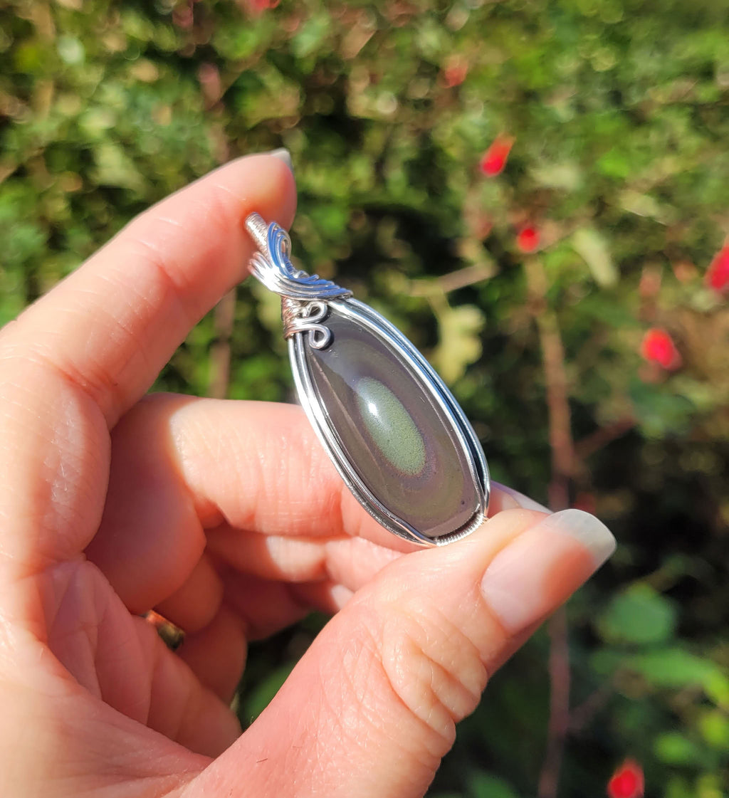Pendentif obsidienne oeil céleste 5,3 cm wire wrapping argenté