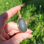 Pendentif obsidienne oeil céleste - wire wrapping doré - pierre naturelle