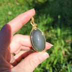 Pendentif obsidienne oeil céleste - wire wrapping doré - pierre naturelle