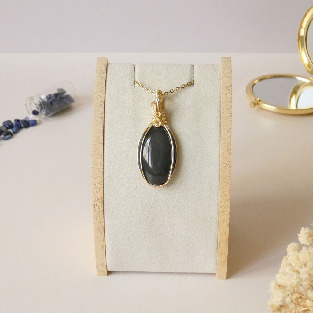 Pendentif obsidienne oeil céleste - wire wrapping doré - pierre naturelle