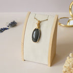 Pendentif obsidienne oeil céleste - wire wrapping doré - pierre naturelle