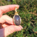 Pendentif obsidienne oeil céleste 4,8 cm wire wrapping doré