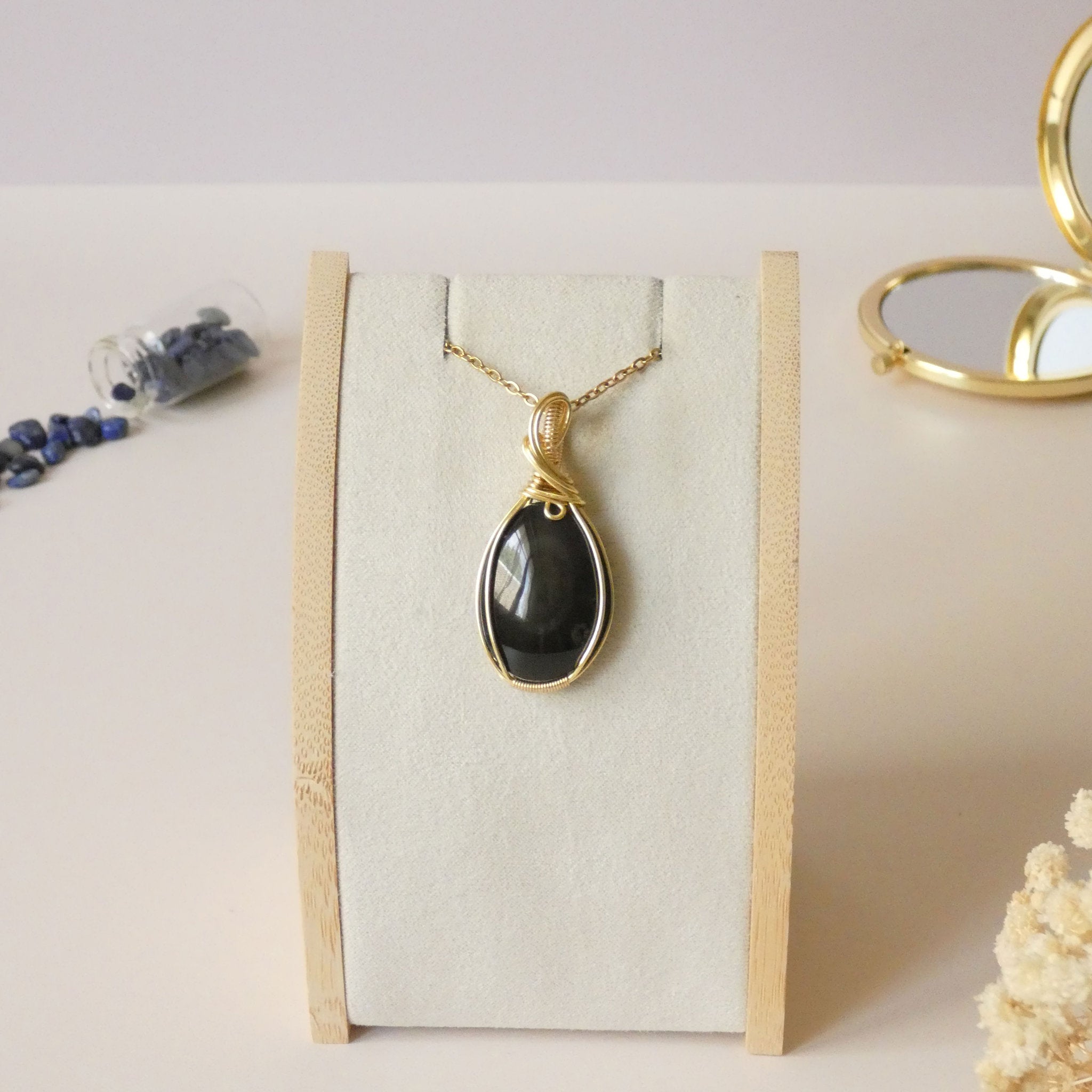 Pendentif obsidienne oeil céleste 4,6 cm wire wrapping doré