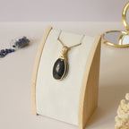 Pendentif obsidienne oeil céleste 4,6 cm wire wrapping doré