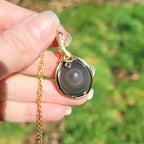 Pendentif en obsidienne oeil céleste wire wrapping doré – 3,8 cm