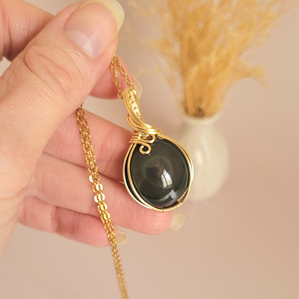 Pendentif en obsidienne oeil céleste wire wrapping doré – 3,8 cm
