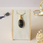 Pendentif en oeil de faucon 5,3 cm wire wrapping doré