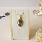 Pendentif oeil de tigre et faucon 4,7cm wire wrapping doré