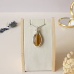 Pendentif oeil de tigre 4,6 cm wire wrapping argenté