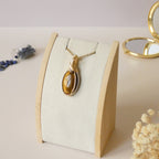 Pendentif oeil de tigre 4,4cm wire wrapping doré