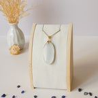 Pendentif en pierre de lune 4 cm – Bélière dorée