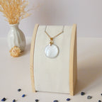 Pendentif en pierre de lune ronde 2,5 cm bélière dorée