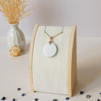 Pendentif en pierre de lune ronde 2,5 cm bélière dorée