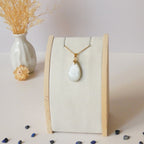 Pendentif en pierre de lune 2,4 cm - Bélière dorée