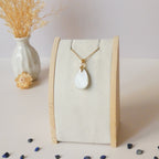 Pendentif en pierre de lune 2,4 cm - Bélière dorée