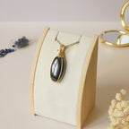 Pendentif en psilomélane – bijou artisanal – wire wrapping doré