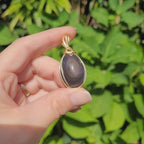 Pendentif obsidienne oeil céleste 4,6 cm wire wrapping doré