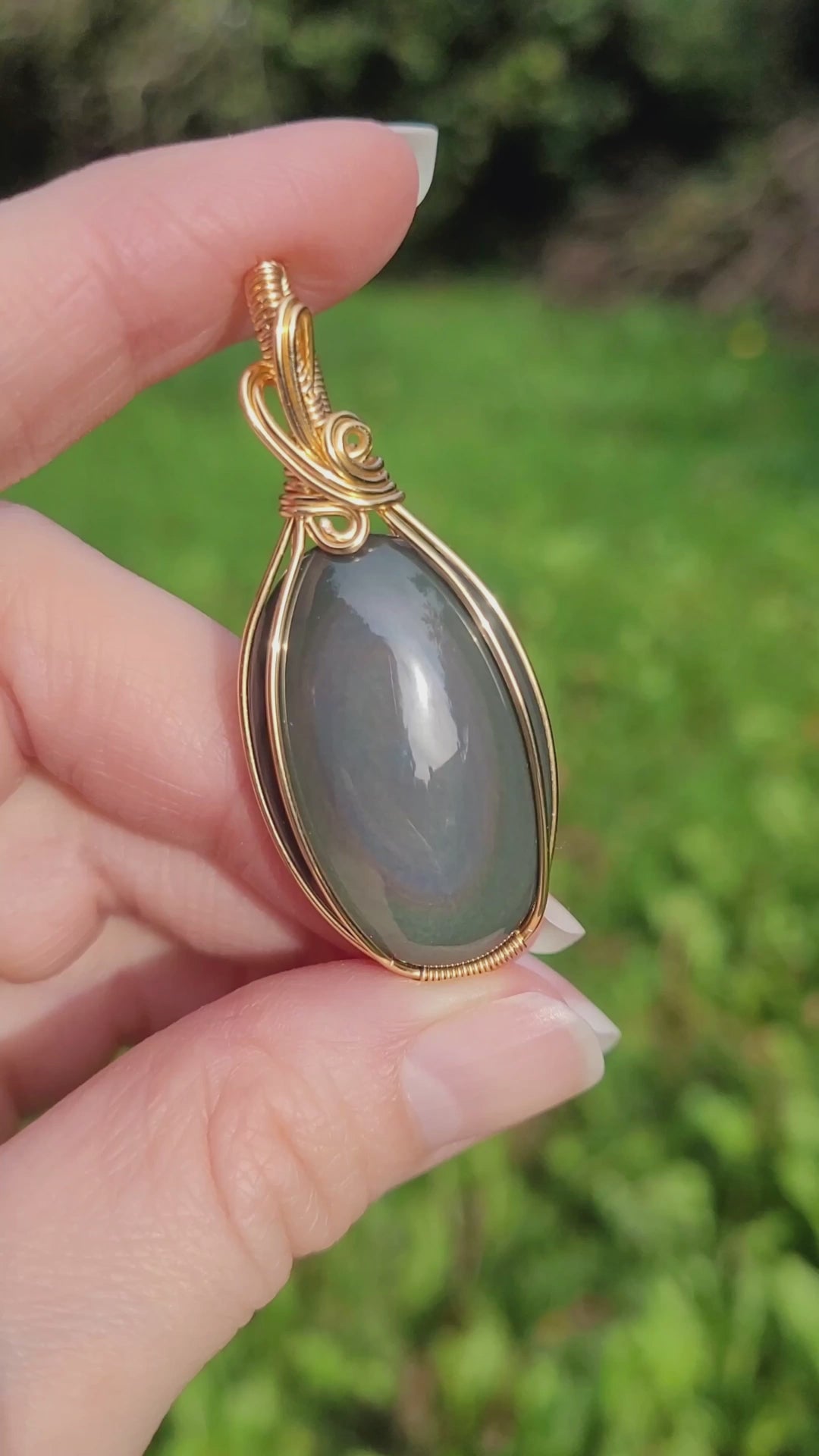 Pendentif obsidienne oeil céleste - wire wrapping doré - pierre naturelle