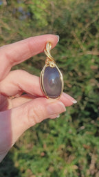Pendentif obsidienne oeil céleste 4,8 cm wire wrapping doré
