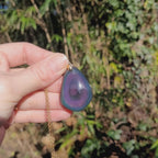 Vidéo rotation pendentif obsidienne œil céleste montrant couches et reflets intenses et profonds