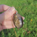 Pendentif obsidienne dorée 4,1 cm bélière dorée