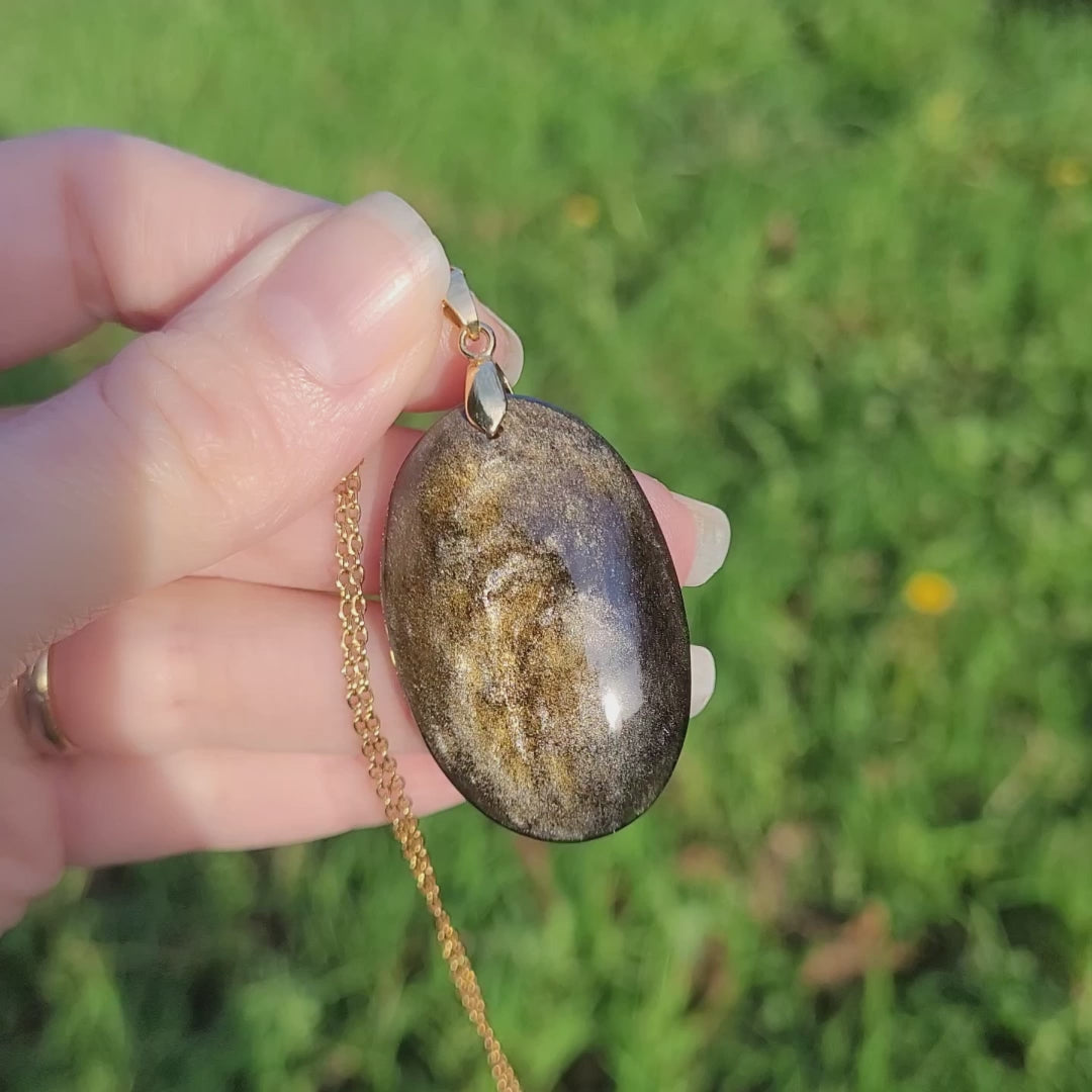 Pendentif obsidienne dorée 4,1 cm bélière dorée