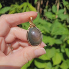 Pendentif obsidienne oeil céleste 4,4 cm wire wrapping doré