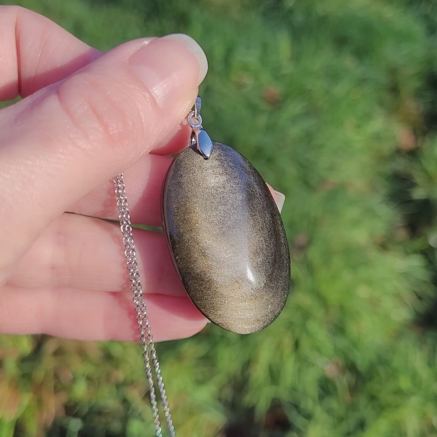 Pendentif en obsidienne dorée 4,3 cm bélière argentée