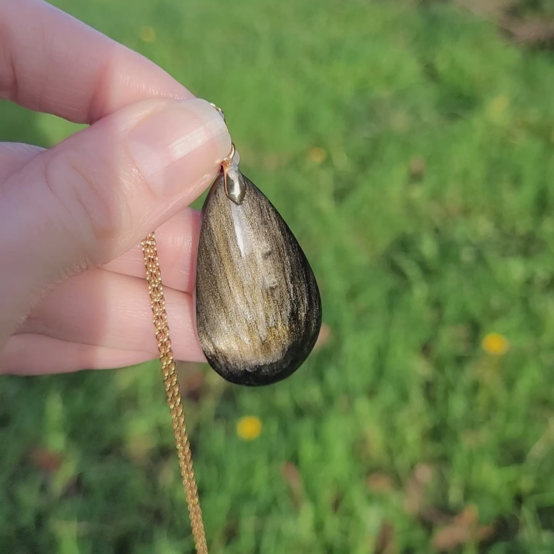 Pendentif obsidienne dorée 4,3 cm bélière dorée