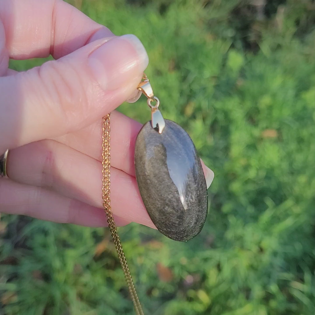 Pendentif obsidienne dorée 3,9 cm bélière dorée